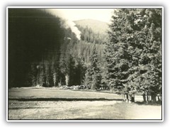 Freight Train making its way uo th emountainto Mullan Pass into Montana. Taken from Shoshone Park
