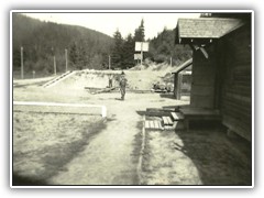 Taken 1937 This view was taken in front of the headquarters bldg. looking to ward the Basketball court.