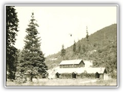 View of the Forest Service office building with the Infirmary in the background.
